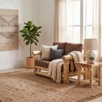 Cedar Log Loveseat: Some lifestyle images are created with AI for visualization purposes. Crafted from natural solid wood, each piece is unique and will vary.