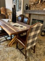 Bristol Tartan Dining Chair - Burnt Umber Cypress Leather & Charcoal Plaid Fabric Back, Shown with the Rustic Live Edge Wood Slab Trestle Dining Table