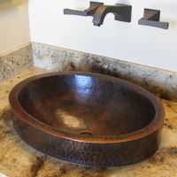 18" Oval Oil Rubbed Bronze Hammered Copper Skirted Vessel Sink