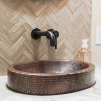 18" Oval Oil Rubbed Bronze Hammered Copper Skirted Vessel Sink