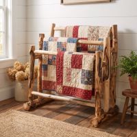 Log Quilt Rack: Some lifestyle images are created with AI for visualization purposes. Crafted from natural solid wood, each piece is unique and will vary.