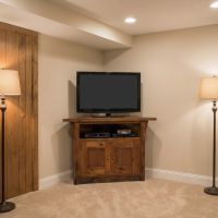 Barn Wood Corner TV Stand: Some lifestyle images are created with AI for visualization purposes. Crafted from natural solid wood, each piece is unique and will vary.