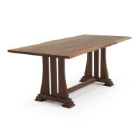 Custom 36" H Live Edge Natural Wood Trestle Dining Table in Black Walnut with a Natural Clear Finish. This custom order features a modified base footing to achieve the 36" H.
