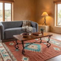 Distressed Copper Coffee Table: Some lifestyle images are created with AI for visualization purposes. Crafted from natural solid wood, each piece is unique and will vary.