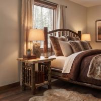Hickory Log Nightstand: Some lifestyle images are created with AI for visualization purposes. Crafted from natural solid wood, each piece is unique and will vary.