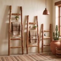 Aspen Log Ladders: Some lifestyle images are created with AI for visualization purposes. Crafted from natural solid wood, each piece is unique and will vary.